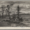 Mechanical digger and wagons at work on the road bed of the railroad spur to join the Milwaukee Electric Railway & Light Comapny at Greendale, Milwaukee Suburban Resettlement Project.