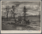 Mechanical digger and wagons at work on the road bed of the railroad spur to join the Milwaukee Electric Railway & Light Comapny at Greendale, Milwaukee Suburban Resettlement Project.