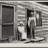 Nick Phillips, eighty-one years old with wife in front of house. Ashland, Missouri. Missouri game and arboretum project. Columbia, Missouri.
