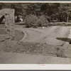 Cattle gate on estate near Batesville, Arkansas. The cattle will not walk over this rail opening in the road.