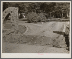 Cattle gate on estate near Batesville, Arkansas. The cattle will not walk over this rail opening in the road.