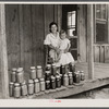 Rehabilitation client and food canned at the suggestion of Resettlement Administration rehabilitation supervisor. Near Batesville, Arkansas.
