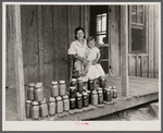 Rehabilitation client and food canned at the suggestion of Resettlement Administration rehabilitation supervisor. Near Batesville, Arkansas.