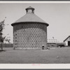 Corn crib of concrete blocks, capacity 7000 bushels, harvest of 140 acres. Central Illinois.