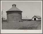 Corn crib of concrete blocks, capacity 7000 bushels, harvest of 140 acres. Central Illinois.