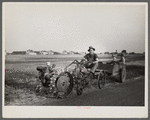 A homesteader at Decatur, Indiana, with a garden tractor. Decatur Homesteads.