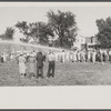 Firemen's muster. Boothbay center, Maine. Volunteer fire companies compete for one hundred dollars to the company which can throw water farthest with hand-operated pumps.