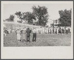 Firemen's muster. Boothbay center, Maine. Volunteer fire companies compete for one hundred dollars to the company which can throw water farthest with hand-operated pumps.