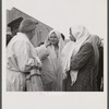 Teheran, Iran. Mrs. Louis Dreyfus, wife of the United States Minister to Iran, talking with native girls.