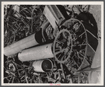 Salvage. Farm scrap. Hay rakes, farm wheels, hot-water tanks and auto springs long past their prime are contributed by Michigan farmers to the scrap-collection drive.