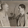Baseball players in war production. Lunch hour at California Ship Building Corporation finds two of baseball's major leaguers talking things over. As fellow ship-builders at the California shipyards, George Stovall, retired manager of the Cleveland Indians, and Vince DiMaggio, Pittsburgh Pirates outfielder, agree that they're both members of the greatest American team in existence--the team that's all out to beat the Axis.