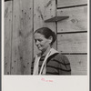 Mrs. Fisher has to set up a boardinghouse everywhere she goes to make ends meet, for she has a family of seven to feed. The small house they rent here has six rooms and they have six roomers.