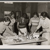 Vocational students making pies
