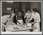 Vocational students making pies