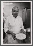 Foodservice worker presenting pie