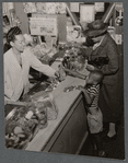 Cashier serving customers