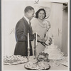 Mr. and Mrs. J. Bellinger Jr. cutting wedding cake