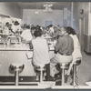 Patrons seated in diner