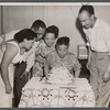 Mrs. Anne G. Jones blowing out candles on 73rd birthday