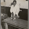 Foodservice worker slicing meat