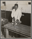Foodservice worker slicing meat