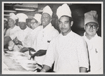 Foodservice workers in restaurant kitchen