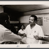 Frederick Wilson conversing at Nandlal's Restaurant