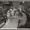 Waitress serving patrons at My Shade Restaurant