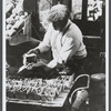 Produce vendor packing fruit