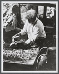 Produce vendor packing fruit