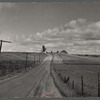 Many Vermont farms lie close to the highways. This one is near Westfield, Vermont.