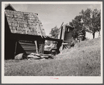 Old farmhouse and privy. Lowell, Vermont.
