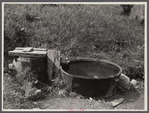 Old iron kettle as watering trough. Near Lowell, Vermont.