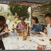 Film crew dining outside at James Baldwin's house