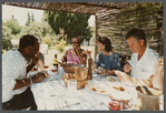 Film crew dining outside at James Baldwin's house
