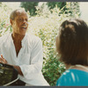 Bernard Hassell talking with film crew