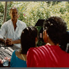 Bernard Hassell talking with film crew
