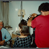 Older man with mustache being filmed