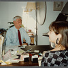 Older man with mustache being filmed