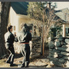 Film crew shooting house exterior