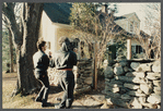 Film crew shooting house exterior