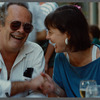 Karen Thorsen laughing with older man in sunglasses