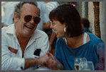 Karen Thorsen laughing with older man in sunglasses