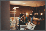 Crew gathered in room during making of documentary