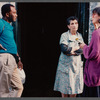 Film crew talking to woman in doorway in Paris