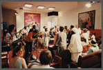 Churchgoers stand during filming at Central Holiness Church of God