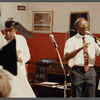 Man in tie singing at Central Holiness Church of God