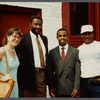 Karen Thorsen standing with three men