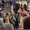 David Baldwin standing amid crowd at James Baldwin's funeral