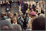 David Baldwin standing amid crowd at James Baldwin's funeral